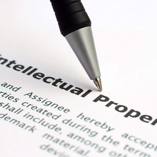Real Estate And Business Litigation Law Firm - Pen pointing at word "Property."